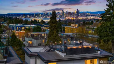 Puget Sound, the Olympics, downtown Seattle, mountains, sunsets, city lights—it is all up here, and it gives this home a level of wow factor that hits the moment you start imagining evening cocktails, weekend hangs, or a quiet morning coffee above it all.