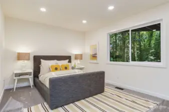 Downstairs has three large bedrooms with nature views.