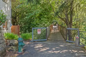 This pedestrian bridge right outside your front door connects you to the Kiwanis Nature Preserve and the rest of Magnolia. Super convenient!