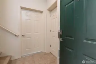 Lower Level Entry. Private Elevator Door On Right