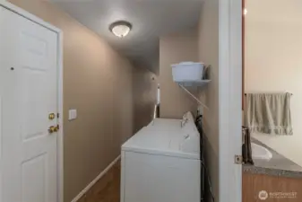 Laundry area next to bath and second exit