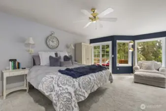The spacious primary bedroom is the retreat you’ve been dreaming of—complete with a fireplace and private deck access.