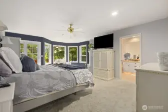 This spacious primary suite has room for all your bedroom essentials—and then some.