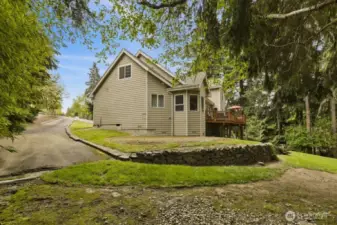 The extended driveway offers ideal RV parking, complete with its own dump station for added convenience.
