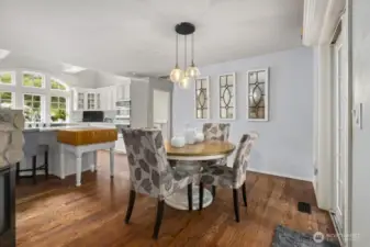 The eating area sits just off the kitchen, offering flexibility for everyday meals or entertaining.