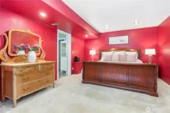 Lower level primary suite with large ensuite bathroom, walk-in closet - and an office!