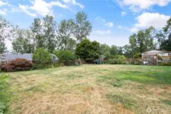 Fully fenced, with landscaping.