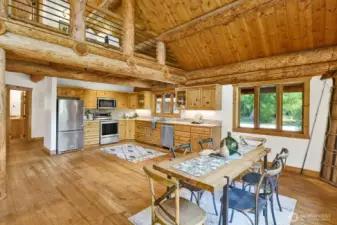 The open plan is airy and bright. The great room is open to the dining room and large kitchen
