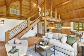 Note the upper loft area which features a sitting area and a huge primary suite