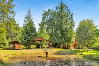A view of the home and driving range from the golf course