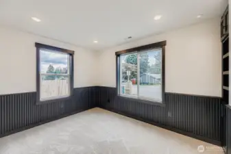 Main-floor office with built-ins & wainscoting