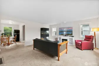 Living room flows easily into dining room / kitchen