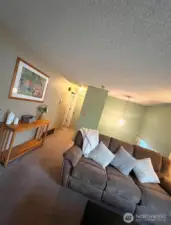 Hallway to primary and upstairs bath