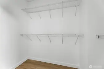 Walk-in hallway closet offers great storage space and organization.