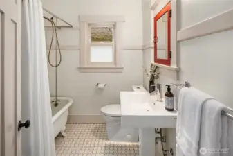 Main floor bathroom with clawfoot tub.
