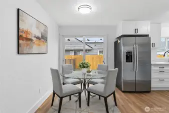 Dining set is virtually staged.