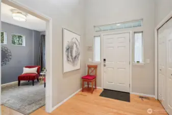 Entrance with expansive open to below and den right next to.