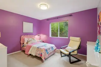 Upstairs bedroom adjacent to full bath.