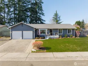 The front of the home feels welcoming and easy to care for.