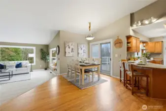 The open-concept dining area connects beautifully to both the living room and kitchen, creating a natural hub for everyday living.