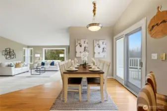 Large windows frame views of the surrounding landscape, adding a peaceful backdrop to every meal.