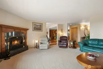 Living Room looking towards the entry way, kitchen & dining room.