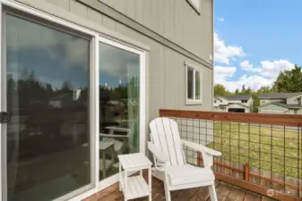 2nd level deck with community vacant land to the right. Enjoy your morning coffee there!