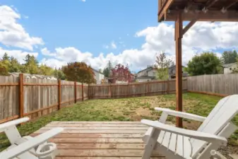 Ground level deck and fully fenced back yard. Possible MIL space.