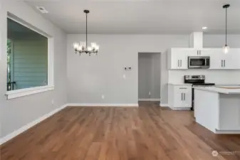 Adjacent Dining Area overlooking the covered back deck.