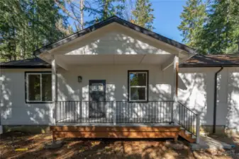 Covered Entry Deck and Steel Railings Welcome you home.