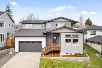 Welcome to 2080 Bakerscape. Better than new home perched up to enjoy expansive views.