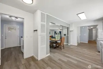 Utility room and exterior door leading to BBQ gazebo just outside.