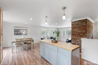 The dining room, living room, kitchen view.