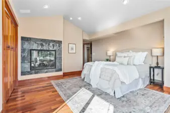 There is a see-through gas fireplace in the primary bedroom and ensuite bathroom