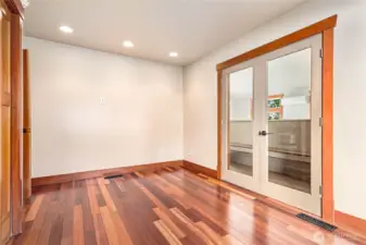 There is another office with 2 closets, and french doors that open to the poolhouse