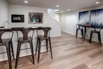 Entertaing space with wet bar and microwave