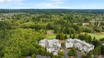 Welcome to First Green! Enjoy the views of Harbour Pointe Golf Course and mature evergreens. There are two secured buildings in this complex and they're located on a quiet cul-de-sac.