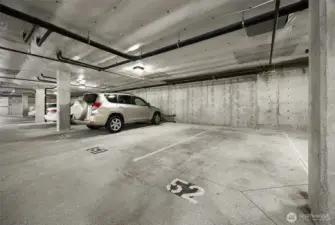 Two assigned parking spots located in the secured lower garage in Building 2.
