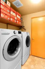 mud room with full size washer & dryer and direct access to the garage.