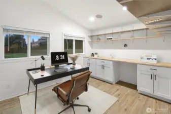 Outbuilding virtually staged as an office.