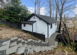 Rear Stairs to Fire Pit, Back Yard Deck, and Alley