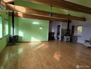 great room with wood and propane stoves