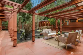 Enjoy serene living with private front Japanese inspired Zen garden courtyard, charming stone walkways & numerous seating areas