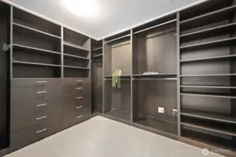 Primary walk-in closet with organizers