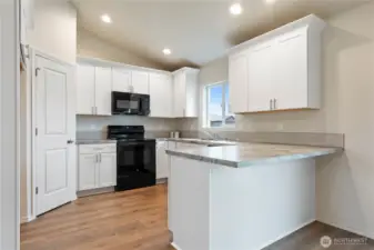 Photos are from a previously built home. Photo renderings may include upgrades/furnishings not included in base price.