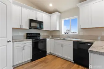 Photos are from a previously built home. Photo renderings may include upgrades/furnishings not included in base price.