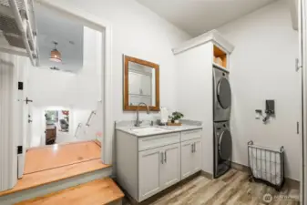 The laundry is conveniently located between the garage, the pool, and the kitchen