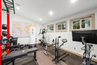 The workout room is perfectly located adjacent to the pool and bathroom