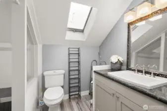 Upstair 3/4 bath.  Skylight.