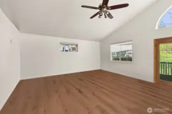 Living room in the ADU.  Door at right leads to the elevated deck.